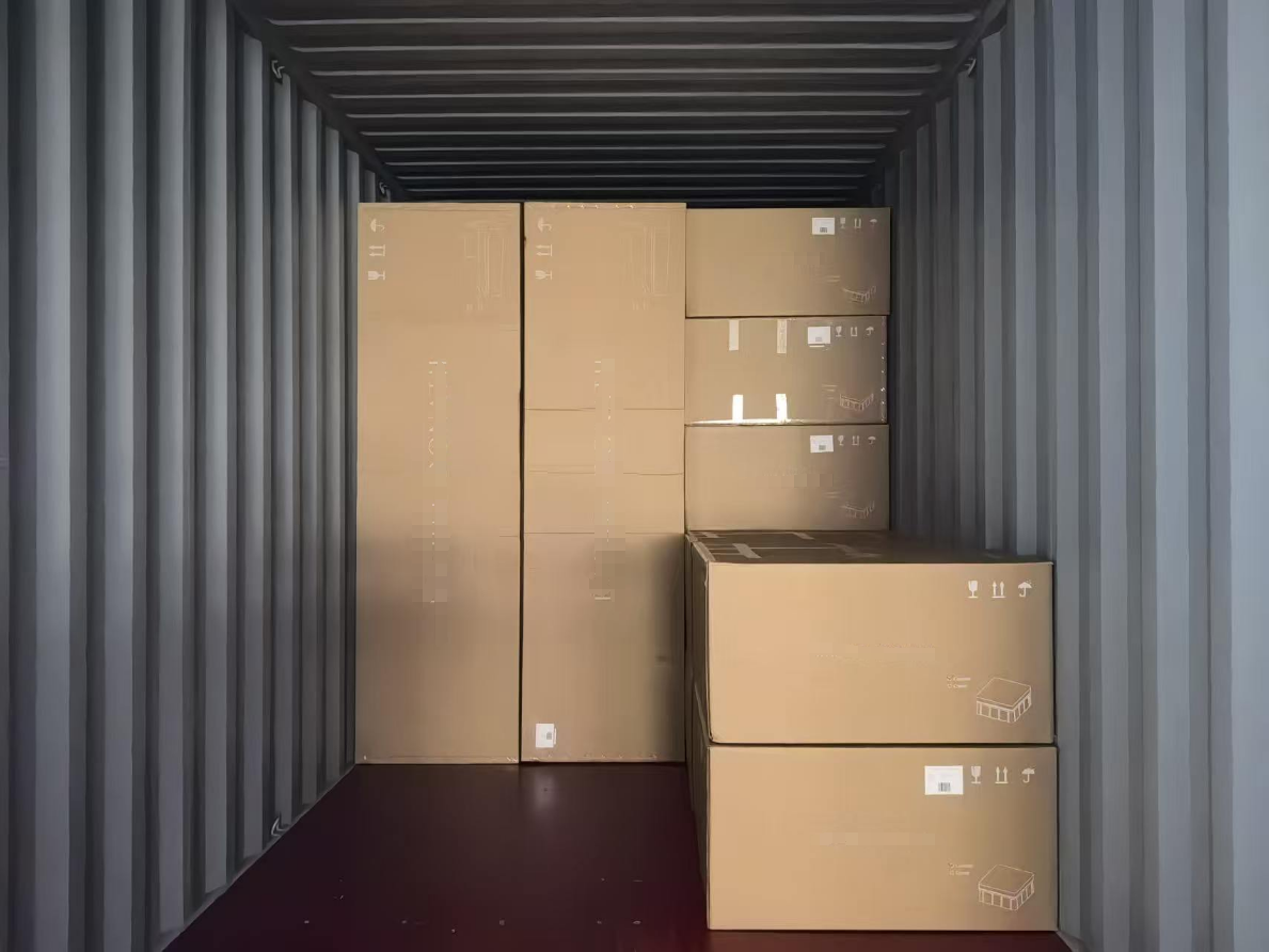 Container loading process -- furniture secured inside shipping container