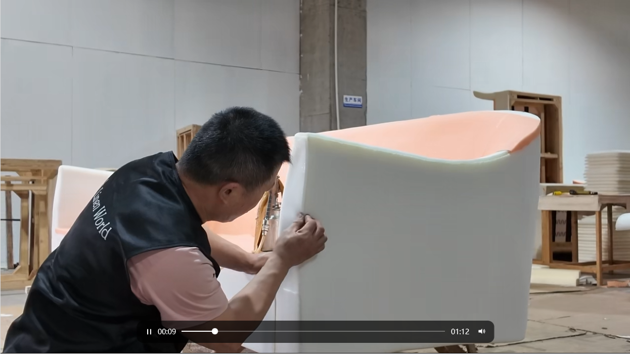 Linen World quality control team reviewing finished furniture pieces