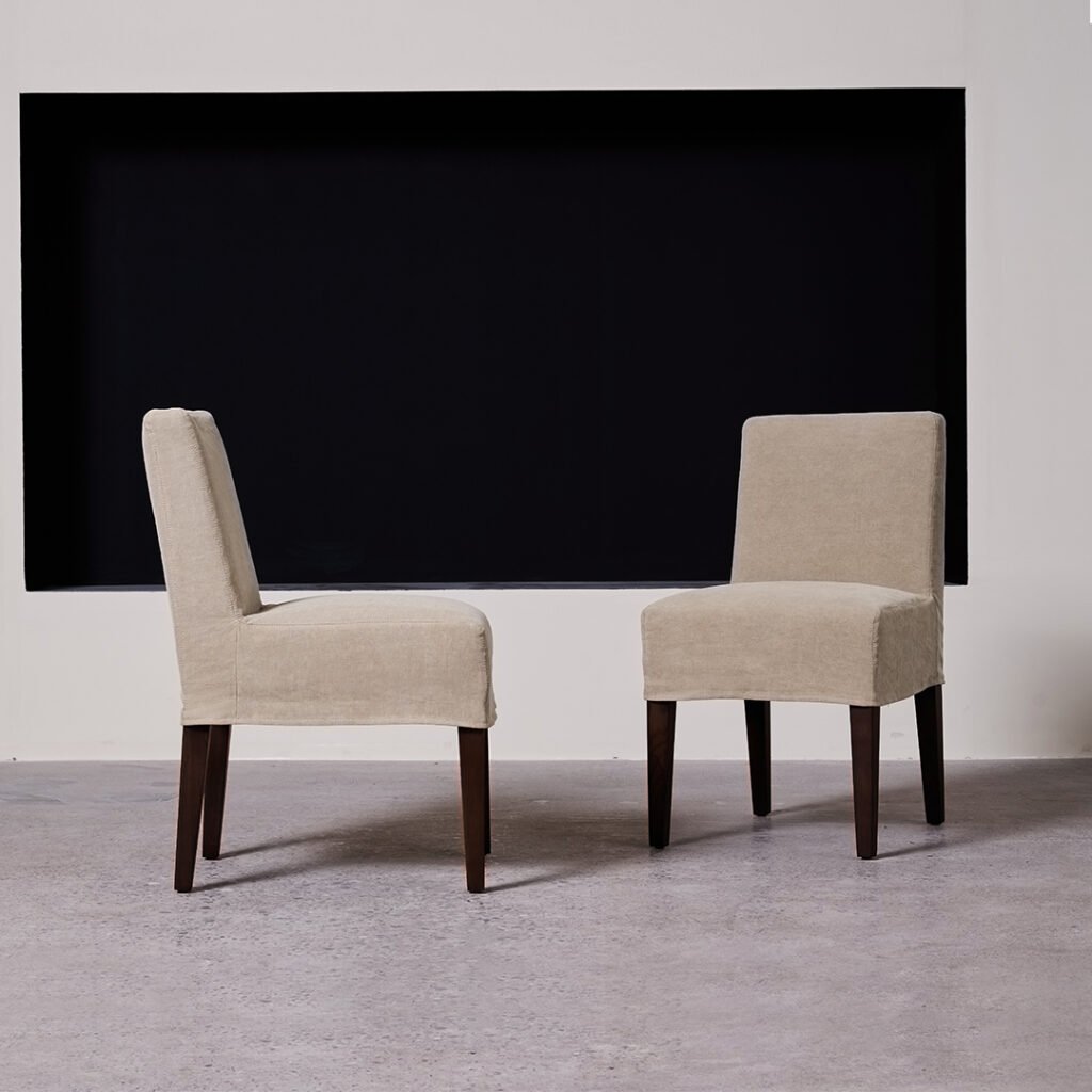 Noma Armless Dining Chair with Walnut Legs