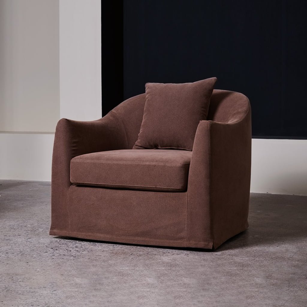 Lyndon curved swivel lounge chair in HALO-04 upholstery